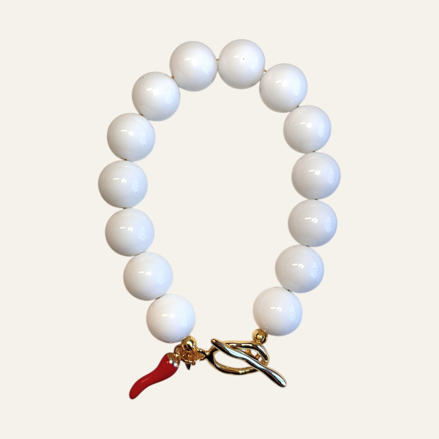 Handmade white jade bracelet with 18K gold-plated details luxury jewelry Amsterdam